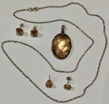 A 9ct gold locket and chain; a pair of 9ct gold earrings; another pair; 11g gross