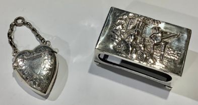 A late Victorian silver match box sleeve, embossed with a courting couple, 6cm, Birmingham 1899,