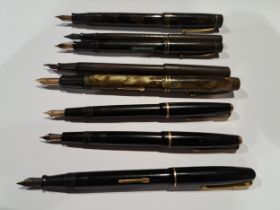 A Harrods marbleised fountain pen, 14ct gold nib; an Onoto De La Rue marbleised fountain pen, 14ct