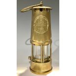 A brass miner's lamp, The Eccles Protector, safety lamp