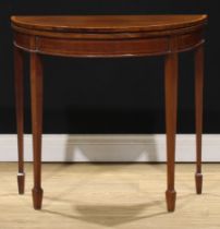 A Sheraton Revival satinwood crossbanded mahogany demilune card table, 71.5cm high, 75cm wide,