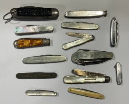 A collection of pocket pen and fruit knives, including silver and mother of pearl, advertising, Girl