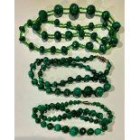 A string of malachite beads; others (3)