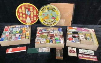 A collection of match boxes and match sleeves, promotional etc; a pair of 1950s school child