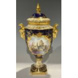A Coalport named view two handled pedestal vase and cover, St. Paul's Cathedral, painted by Lyn