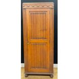 An oak hall cupboard or hanging press cabinet, linenfold panel door, 193.5cm high, 80.5cm wide, 40cm