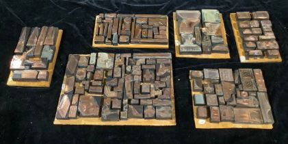 A collection of early 20th century engraved copper plate printing blocks, catalogue images,