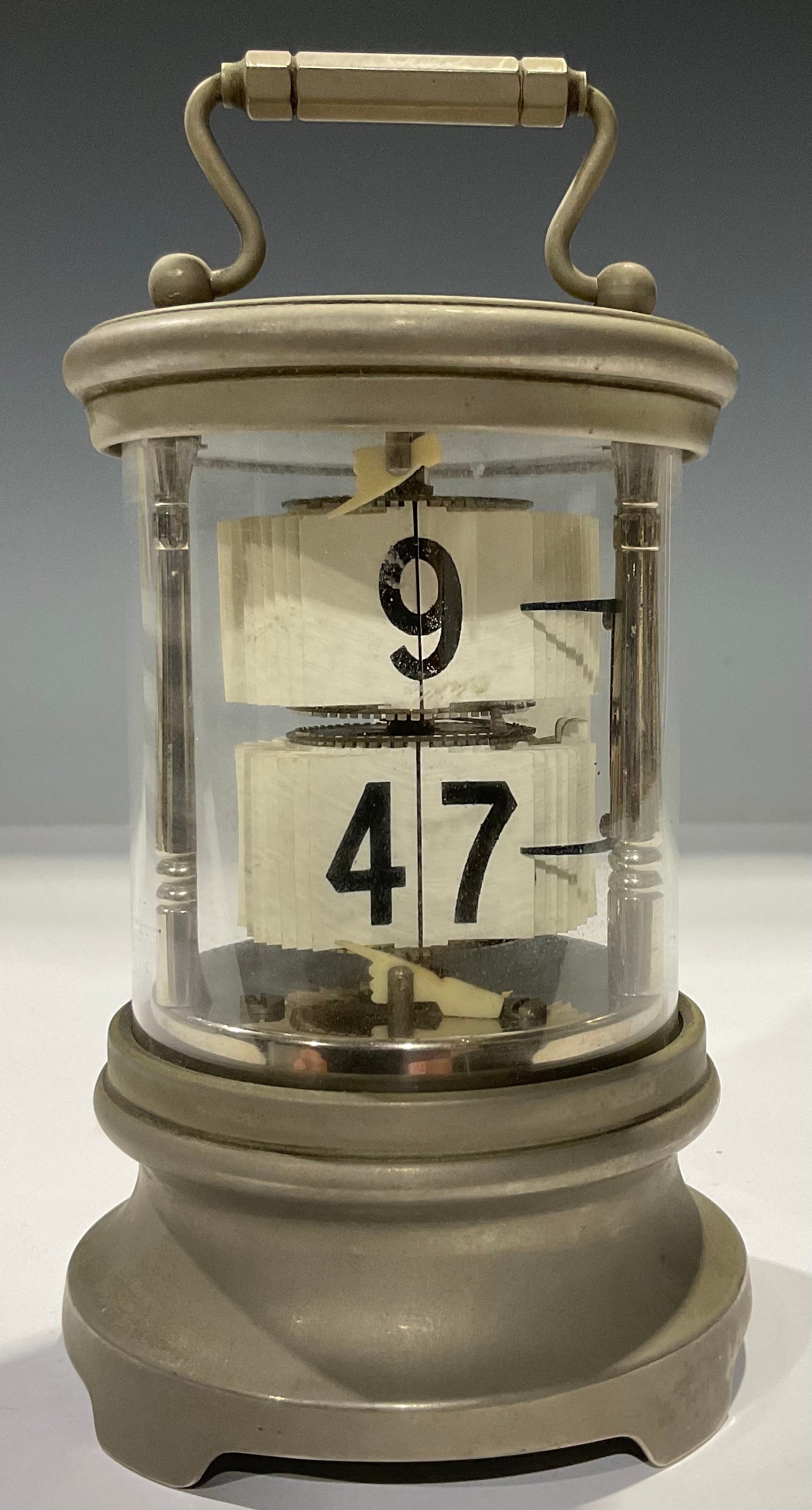 An Ever-Ready Chronos cylindrical flip ticket clock, 16cm high