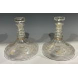 A pair of Georgian ships decanters, each with octagonal stopper, four collar neck, faceted shoulder,