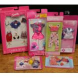 A collection of Mattel Barbie doll clothing outfit sets, comprising Skipper, Shelly and Stacie sets,