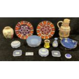 A Wedgwood Jasperware bowl, 20cm diameter; a pair of powder bowls and covers; a vase, 12.5cm; a pair