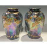 A pair of Fieldings Devon Rural Lustrine ovoid butterfly vases, 19cm high