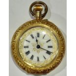 An 18ct gold lady's fob watch, Roman numerals on gilt decorated white dial, the case marked 18k,