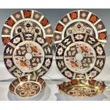 A pair of Royal Crown Derby Imari 1128 pattern side plates, 21.5cm, seconds; an 1128 oval pin tray