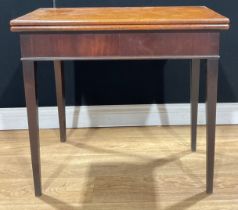 A George III mahogany tea table, of slightly smaller proportions, hinged top, tapered square legs,