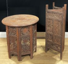 An Anglo-Indian hardwood Hoshiarpur table, 54.5cm high, 53cm diameter; a similar three-fold