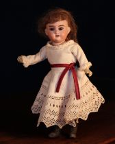 An Armand & Marseille (Germany) bisque head and painted composition bodied doll, the bisque head