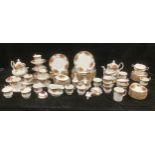 A Royal Albert Old Country Roses part dinner and tea service comprising two large teapots, twelve