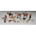 A collection of painted lead figures and animals, including huntsmen, hounds, cat and ball,