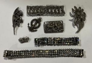 A collection of marcasite silver mounted and paste jewellery, brooches, bracelet, etc
