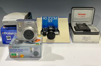 A Minox Special Edition 35ML 35mm miniature camera, with MF 35 ST flash, boxed; A Minolta 110 Zoom