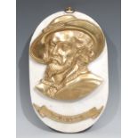 A 19th century gilt brass portrait plaque, depicting Sir Anthony Van Dyke (1599 - 1641), oval