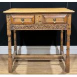 A Charles II style oak and marquetry side table, rectangular top above a long frieze drawer inlaid
