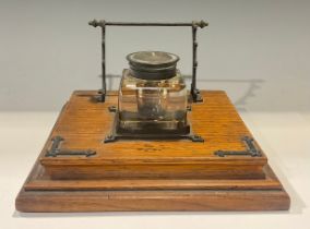 A late Victorian oak inkstand, c.1890