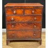 An early Victorian mahogany chest, of two short and three long drawers, 103.5cm high, 92cm wide,