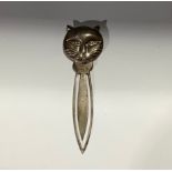 A silver novelty bookmark, as a stylised cat's head, Martin Gerald & Sid Adler, London 2001