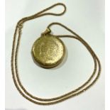 An 18ct gold rope twist necklace and locket pendant, the necklace stamped '750' for 18ct gold, the