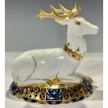 A Royal Crown Derby paperweight, The White Hart Heraldic Stag, third in a series inspired by