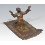 Austrian School (19th/early 20th century), an Orientalist cold painted bronze, of a Muslim Arab,