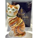 A Royal Crown Derby paperweight, Marmaduke the cat, 13cm high, specially commissioned by The Guild