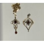 A 9ct gold garnet and seed pearl openwork pendant, suspended from a 9ct gold necklace chain; another