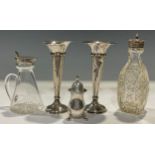 A George V silver mounted clear glass oil/vinegar bottle, 10cm, Birmingham 1934; a pair of George