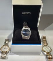 A Seiko Twin Quartz stainless steel gentleman's watch, blue dial, baton indicators, centre