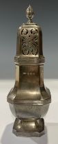 A George V silver sugar caster, pierced domed cover with spire finial, canted square base, 18.5cm, A