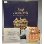 A Royal Crown Derby paperweight, Mulberry Hall Baby Elephant, specially commissioned by Mulberry