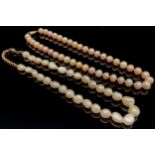A cultured pearl necklace, 50cm long; another, 49cm long (2)