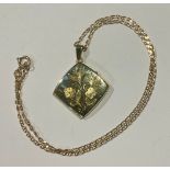 A 9ct gold locket pendant, suspended from a 9ct gold necklace chain, 13.6g