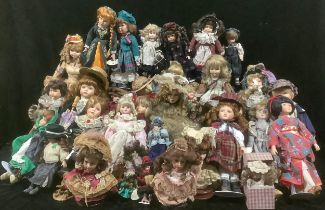 A collection of bisque head artist or collectors dolls including Leonardo Collection, etc, qty