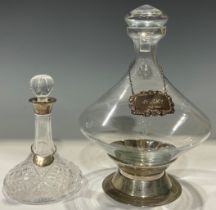 An Elizabeth II miniature cut glass ship's decanter, silver collar, 16cm, Birmingham 1984, with