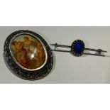 A silver and marcasite oval brooch, set with porcelain miniature, marked 925; a bar brooch (2)