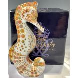 A Royal Crown Derby paperweight, Swirl Seahorse, 16cm high, gold stopper, 16cm, printed mark, boxed