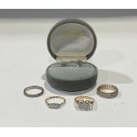 An 18ct gold three stone illusion set diamond ring, size L, 1.7g; a 9ct gold illusion set three