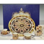 A Royal Crown Derby 1128 pattern Imari palette miniature tea service on tray, comprising, teapot,