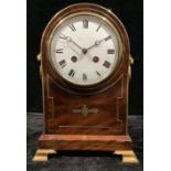A late 19th century mahogany domed bracket type mantel clock, brass inlay, pair of lion mask loop