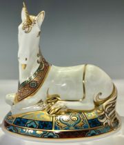 A Royal Crown Derby paperweight, Unicorn, specially designed by Louise Adams to celebrate the New