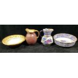 A late Victorian Doulton Burslem wash jug and bowl, profusely decorated in silver with fanciful